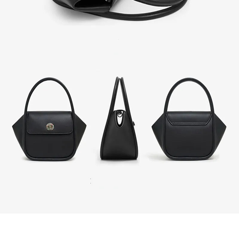 Women's leather wing-shaped tote bag with buckle closure in blue, grey, black, or brown colour options