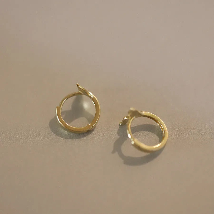 S925 sterling silver fishtail earrings with 14k gold plating in gold and white gold colour options