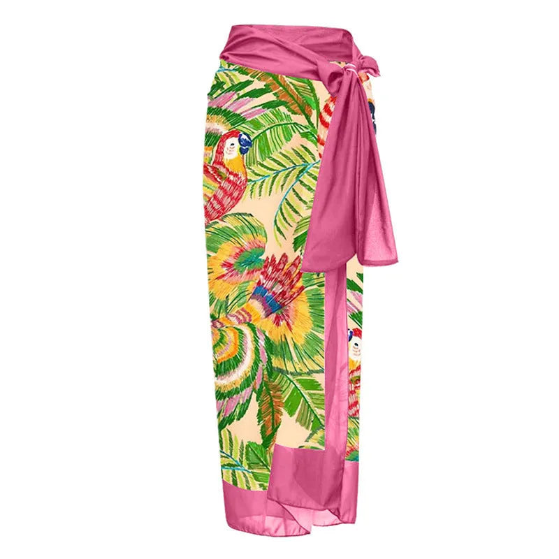 Women's pink floral print one-piece swimsuit with v-neck, covered belly, and attached thin skirt.