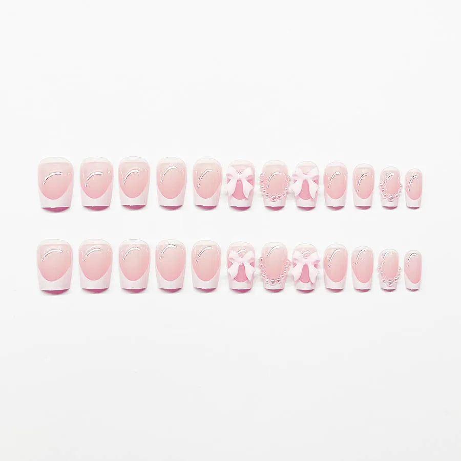 Short square white French manicure nail art set with bow designs and gel adhesive