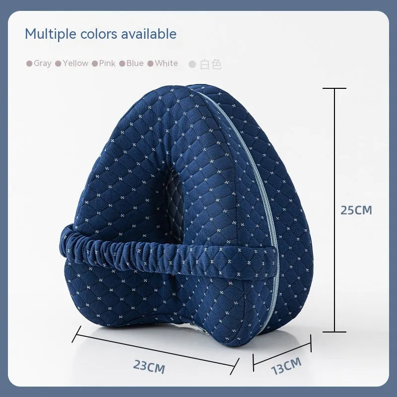 Love heart-shaped dark blue memory foam leg pillow for adult knee and leg support.