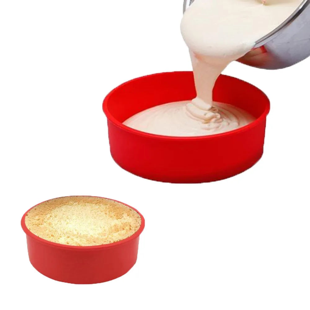 Red round silicone cake mould on a baking tray showing 8 inch size with smooth interior