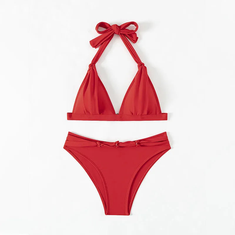 Red women's bikini with lace-up halterneck top and high-cut leg shorts
