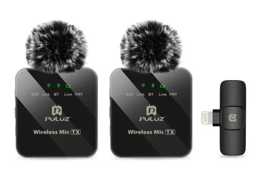 Wireless carbon fibre neckline clip microphone transmitter on a black background with storage box and accessories