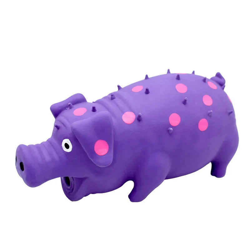 Pig-shaped latex squeaky dog chew toy in various colours with textured surface