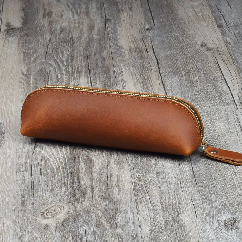 Square cowhide leather pencil case with zip closure measuring 18cm