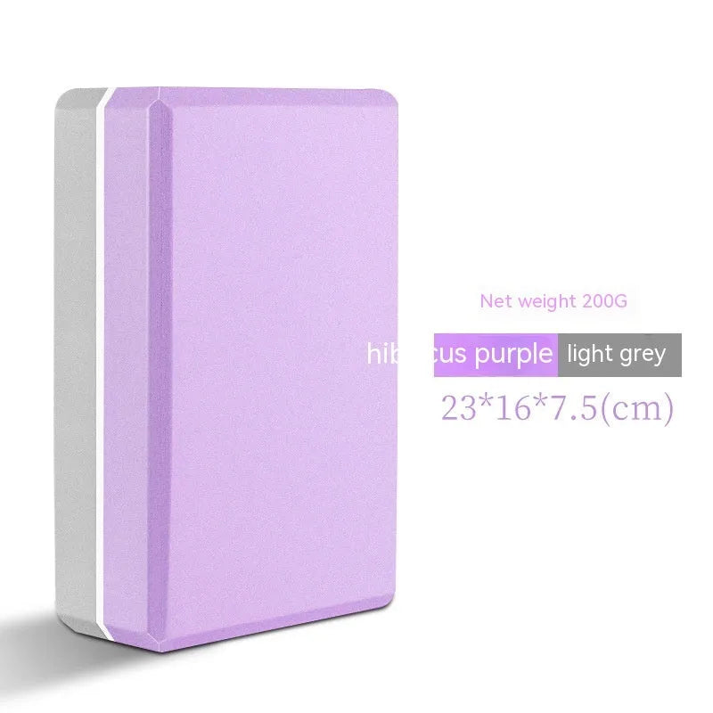 High-density EVA foam yoga block in various colours and prints on a workout mat.