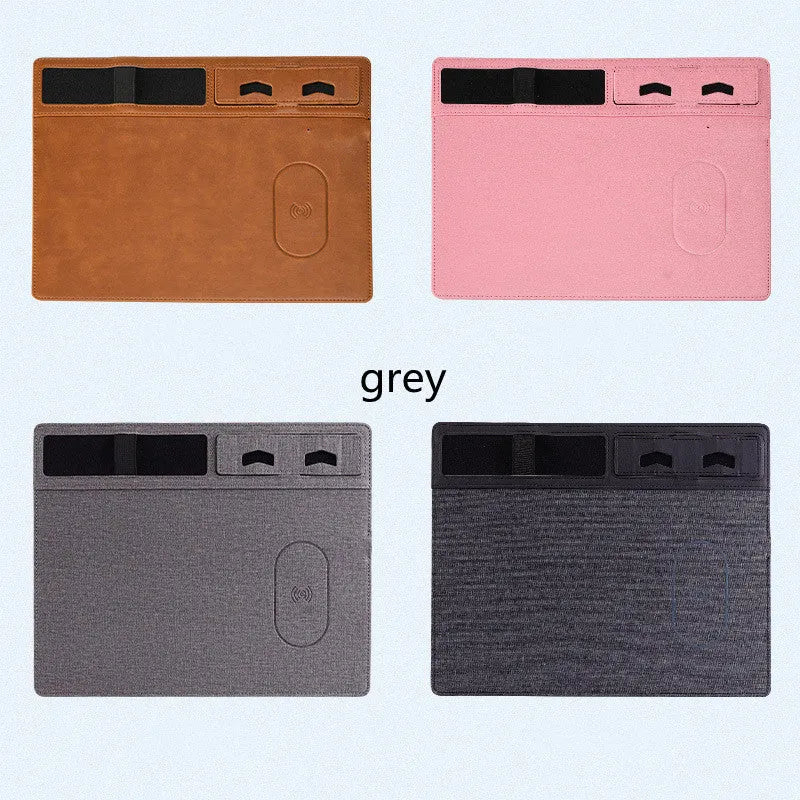 Pink wireless charging mouse pad with phone on charging area and mouse on PU leather surface