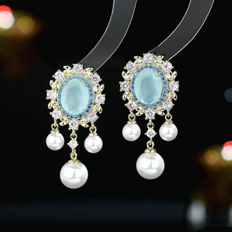 Oval geometric copper earrings with zircon inlay and pearl tassels in light purple, pink, white colour options