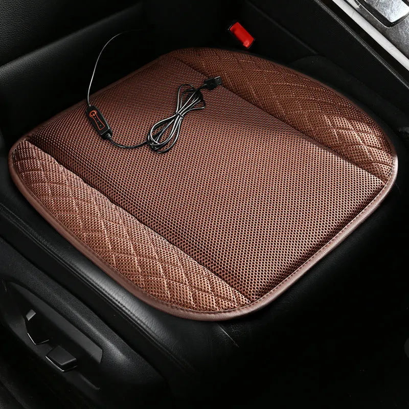 Black USB ventilated car seat cushion with cooling fans on a car seat.