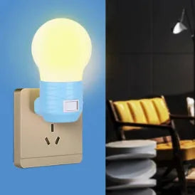 Compact round plug-in bedside lamp in white, blue, or pink for night feeding.