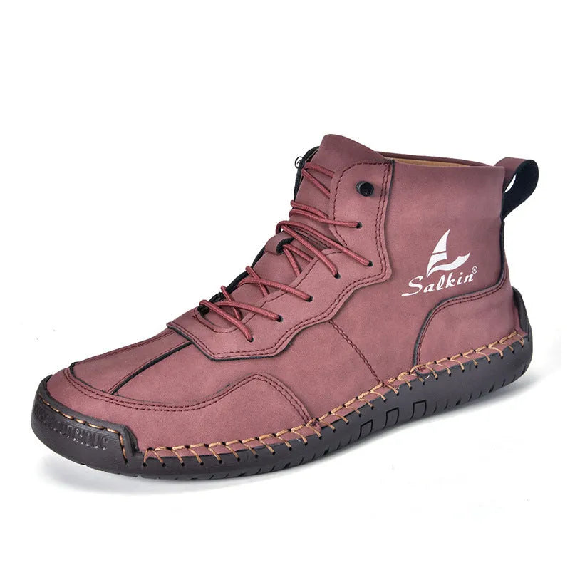 Casual high-top leather boots with elastic band closure and flat heel in beige colour with visible sewing detailing