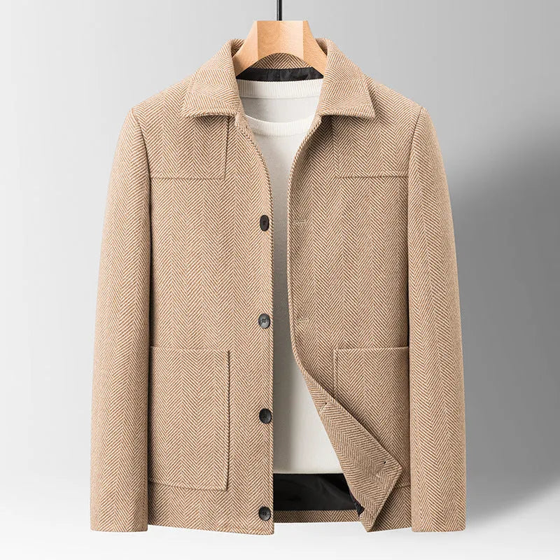 Men's slim lapel woolen jacket in gray with non-ironing finish and side patch pockets on a plain background