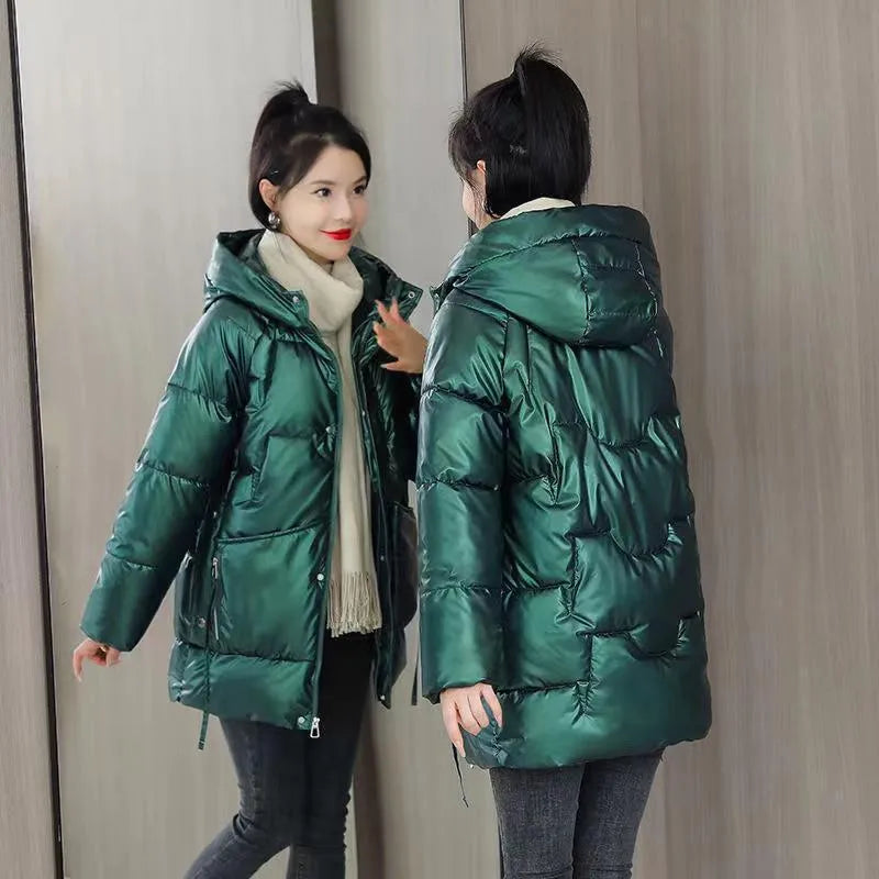 Women's loose thick winter hooded jacket in black colour with long sleeves