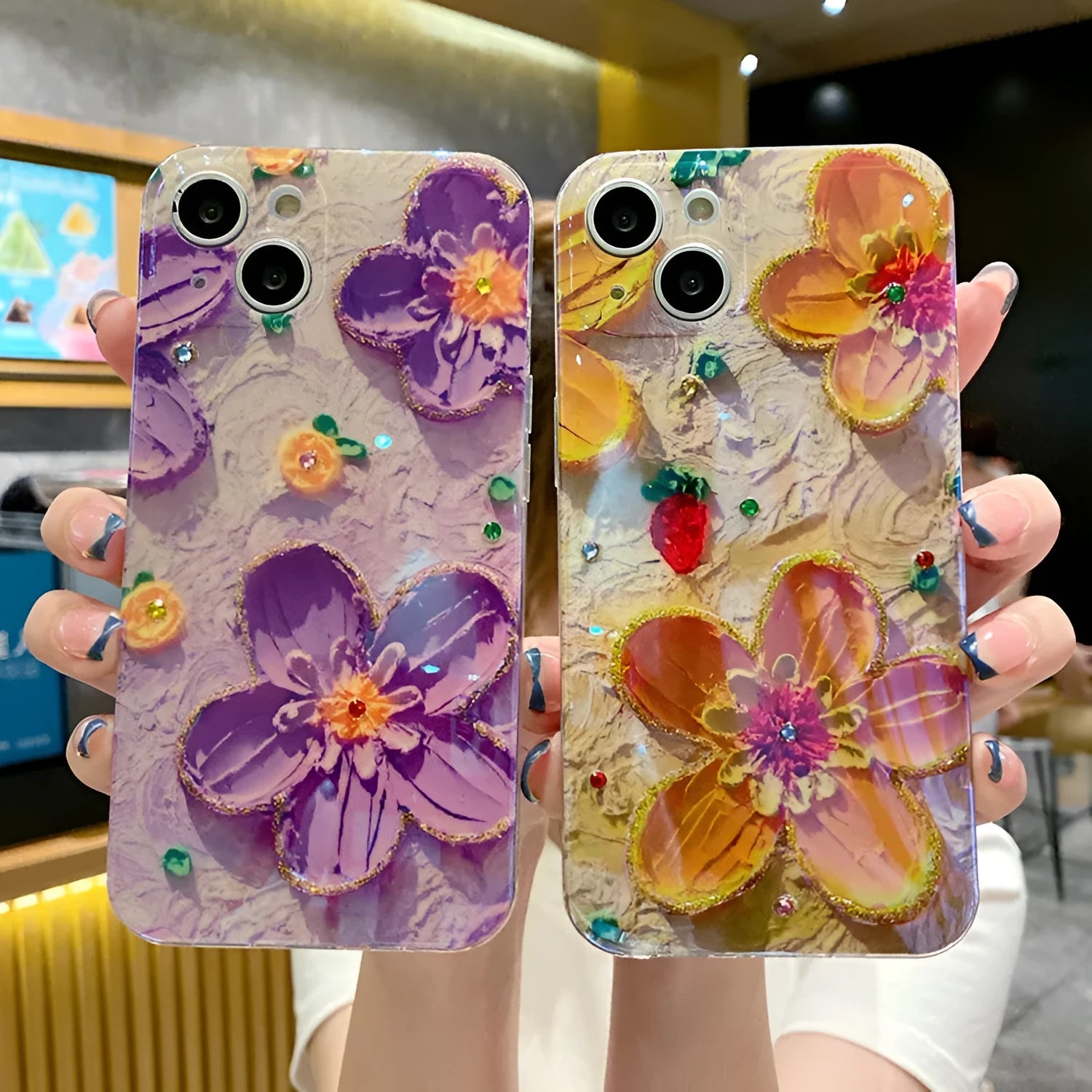 Purple soft rubber phone case with oil painting flower design and inlaid diamond detailing.