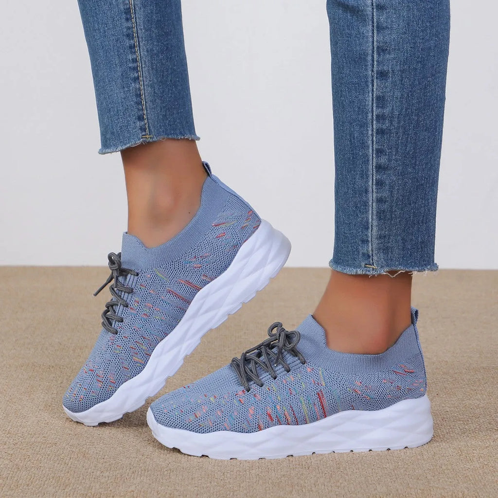 Solid colour women's flying woven pumps with mesh upper, flat heel, round toe, and cross shoulder straps