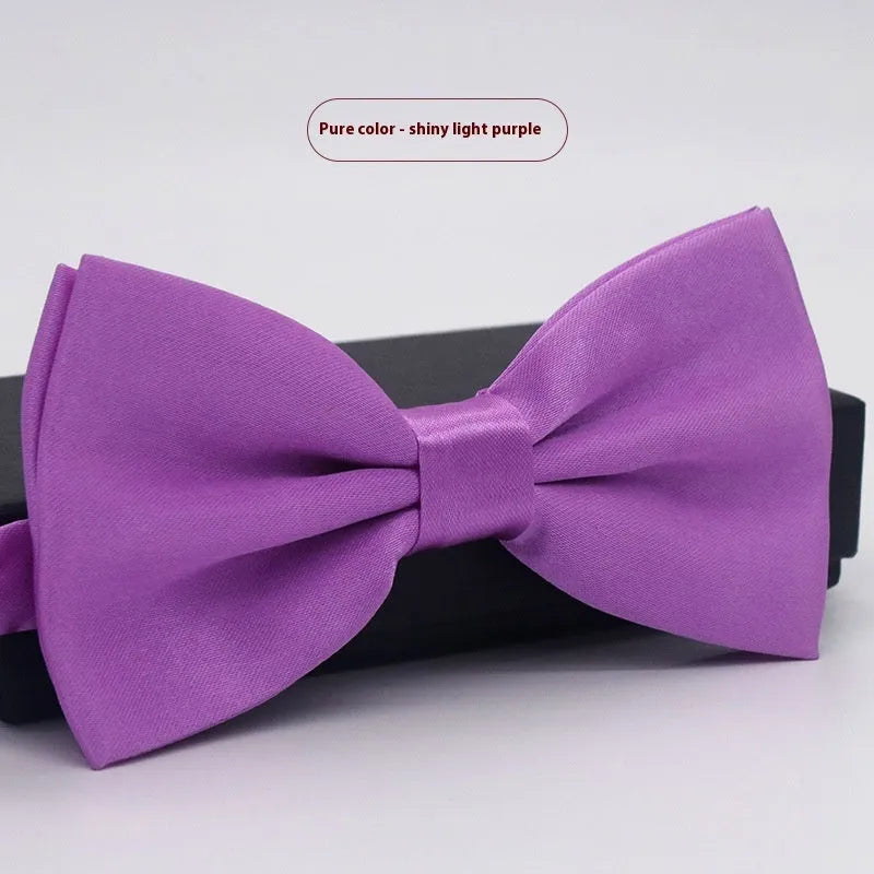Solid colour polyester bow tie with flat head design measuring 12cm by 6cm