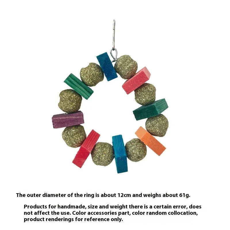 Hamster chew toy with colourful straw balls on ring and applewood molar rod