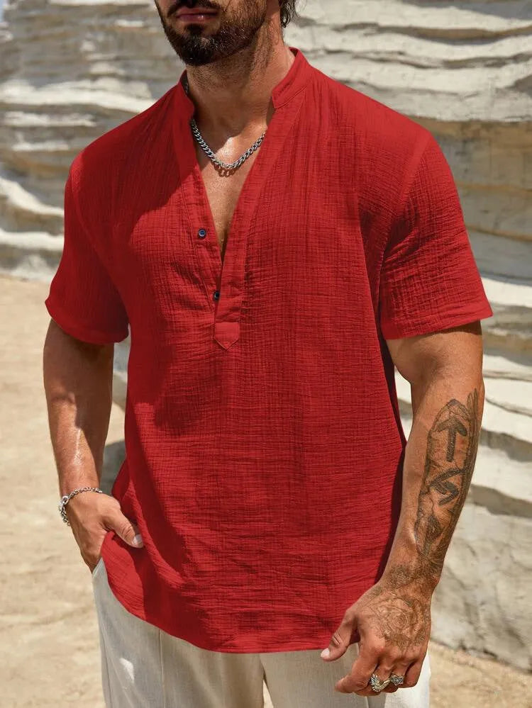 Men's light blue short-sleeved casual shirt with a stand collar.