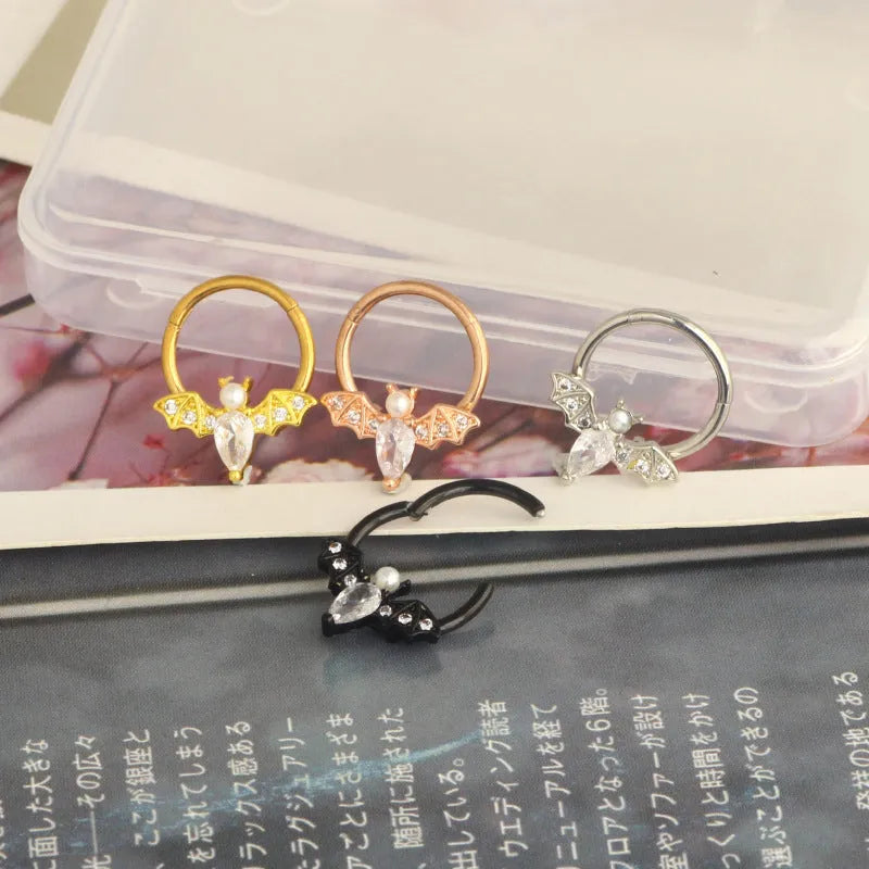 Closed-loop bat nose ring in stainless steel electroplated silver finish with star shape and moon elements