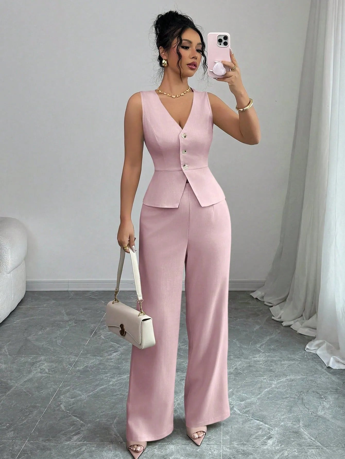 Women's black sleeveless vest and high-waist trousers two-piece casual set