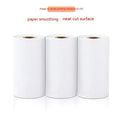 Three rolls of white 57mm wide thermal paper with a 30mm diameter, packaged together in a box.