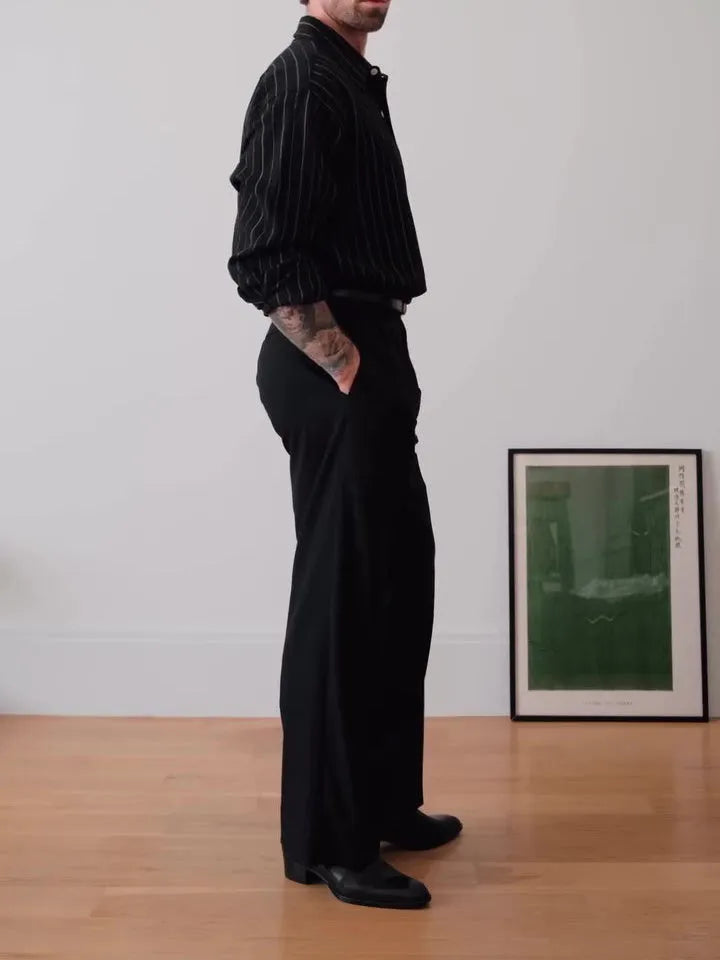 Black pinstripe button-down long-sleeve shirt laid flat, showing regular fit and striped pattern.