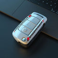 Carbon fibre style car key cover with mirror element in feilin material