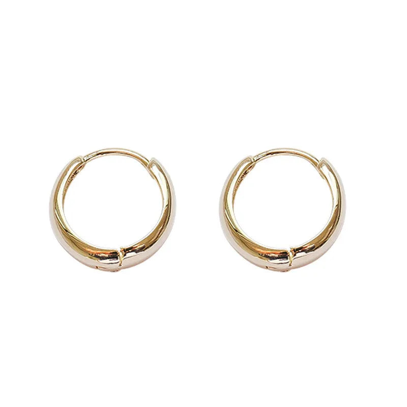 Women's gold and silver water drop earrings in geometric minimalist design with three size options