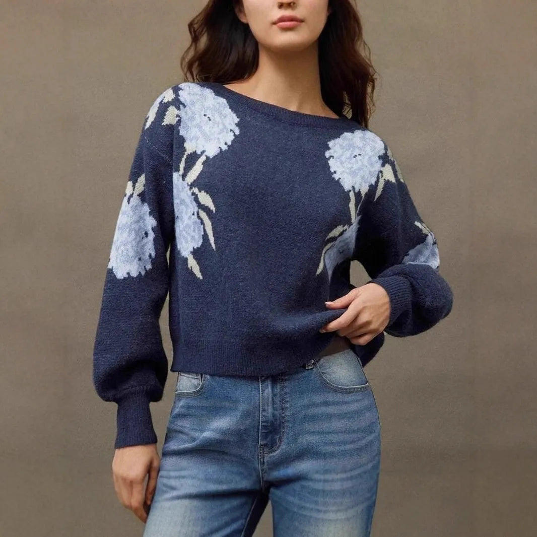 Sapphire blue women's loose pullover with a raised floral jacquard pattern and long sleeves.