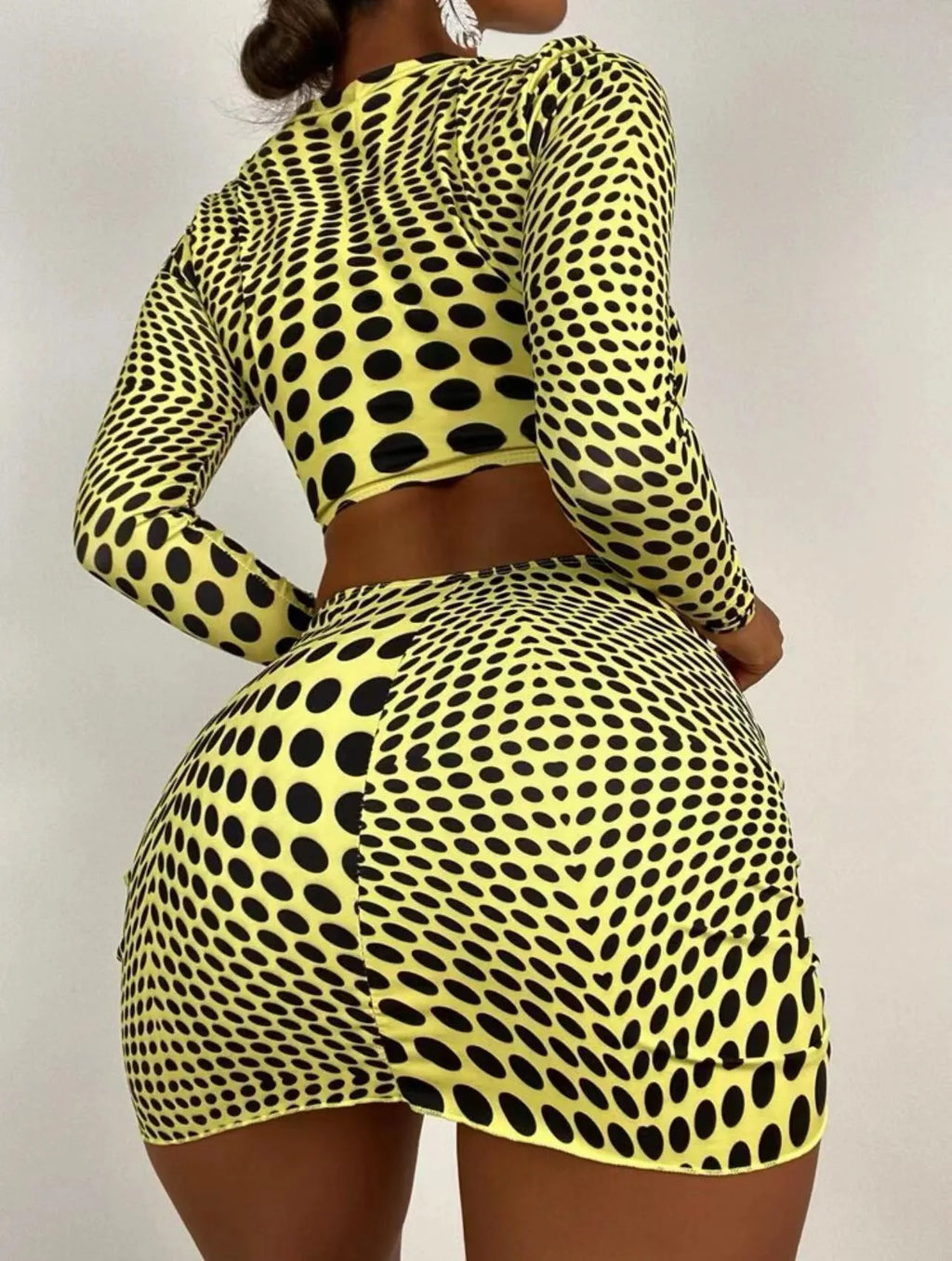 Women's green polka dot swimsuit three-piece set with matching top and skirt