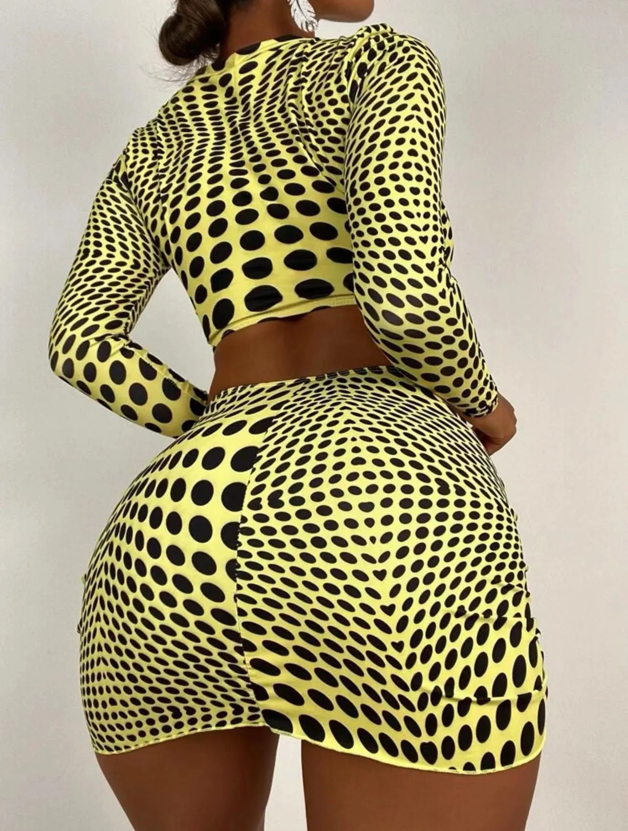 Women's green polka dot swimsuit three-piece set with matching top and skirt
