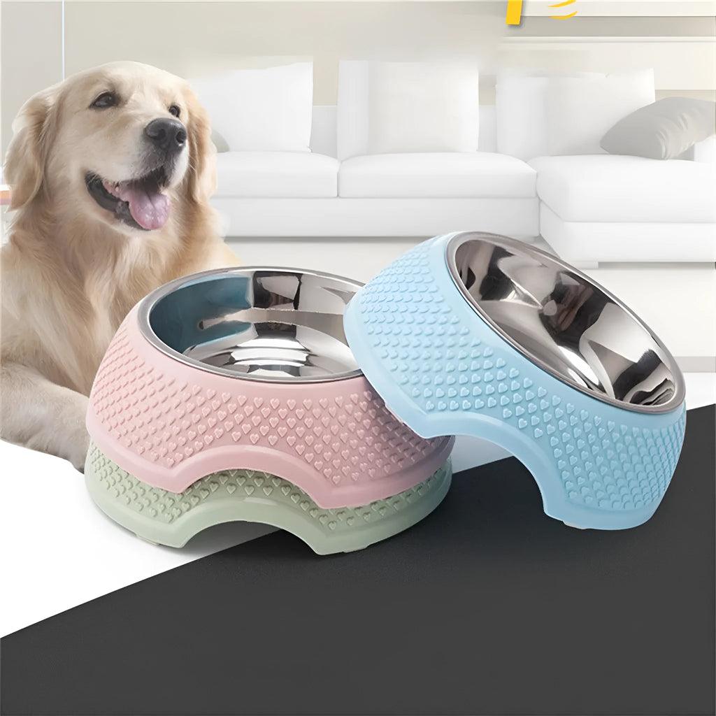 Set of four stainless steel pet bowls with coloured bases, shown from above.