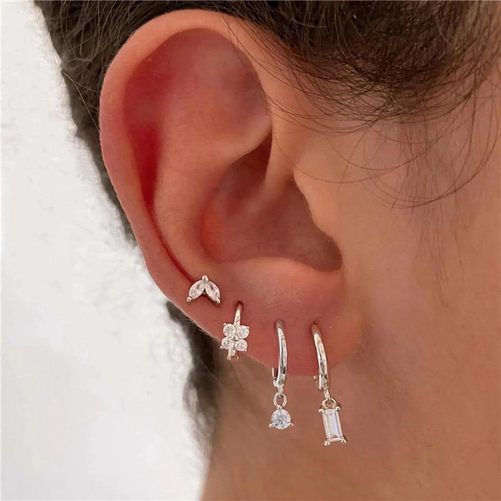 Copper electroplated geometric earrings set showing star, ellipse, ring and quadrilateral designs in gold or silver finish