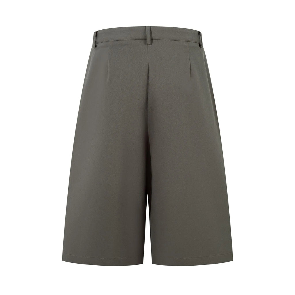 Retro wide leg straight cut denim middle pants in black and green colours showing loose fit and fifth pants length