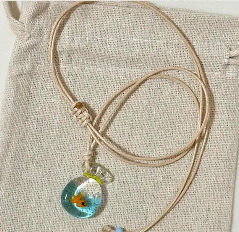Women's coloured glaze skirt pendant necklace with joker design on cotton linen clavicle chain