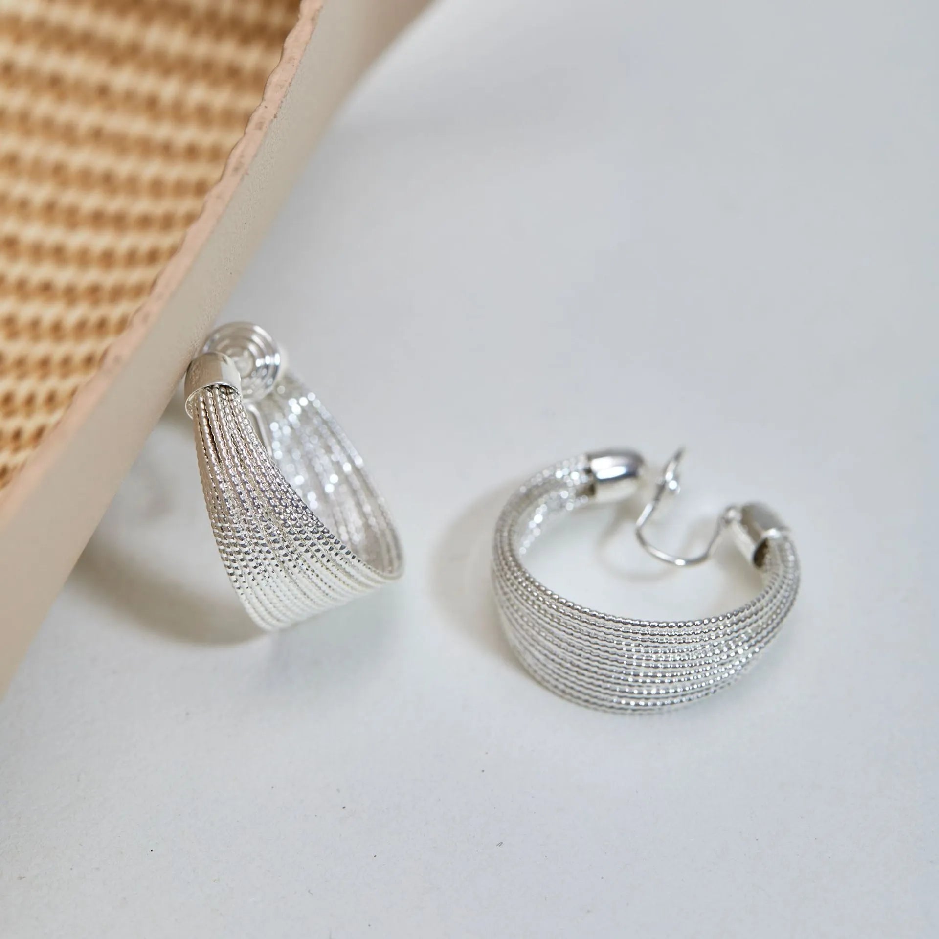Simple geometric earrings and ear clips in silver and gold colour options