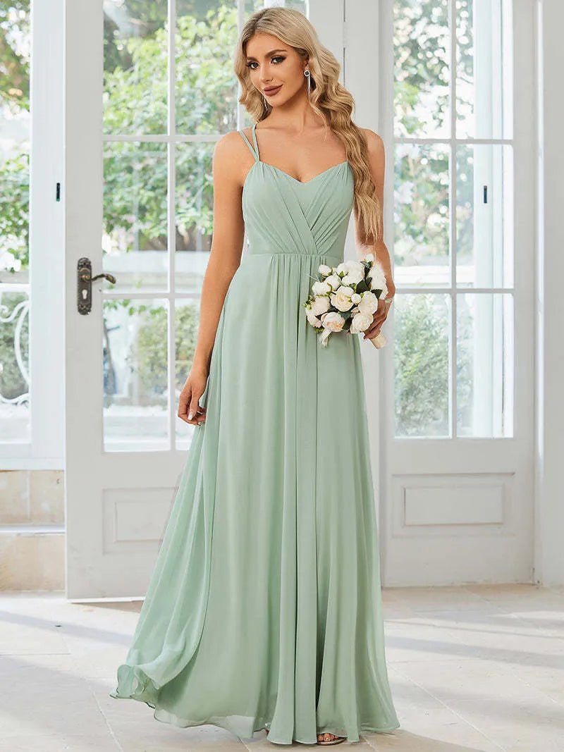 Women's long pleated A-line sleeveless dress in light green solid colour