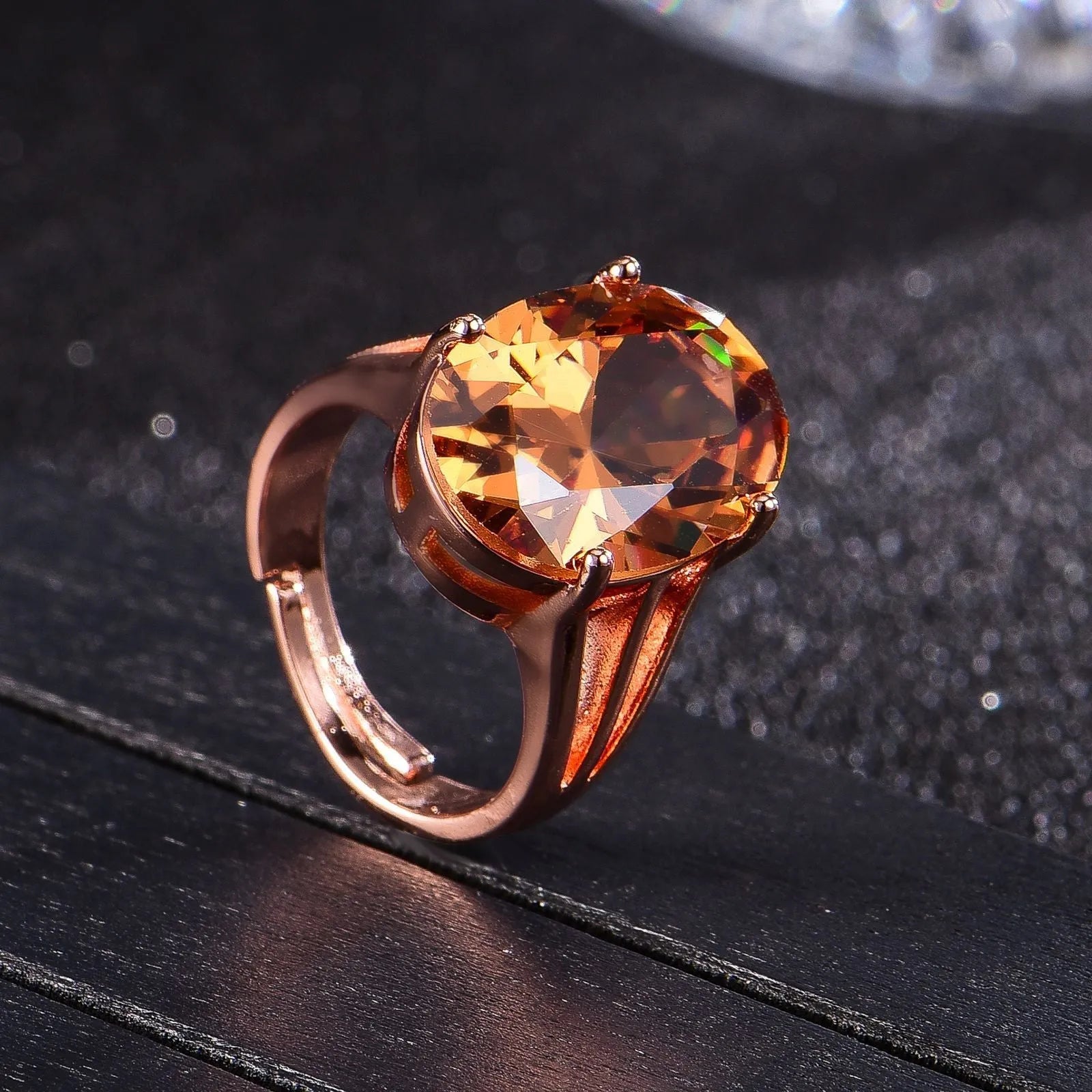 Oval champagne zirconia closed ring with rose gold plating on copper base, adjustable fit sizes 6 to 9, geometric shape