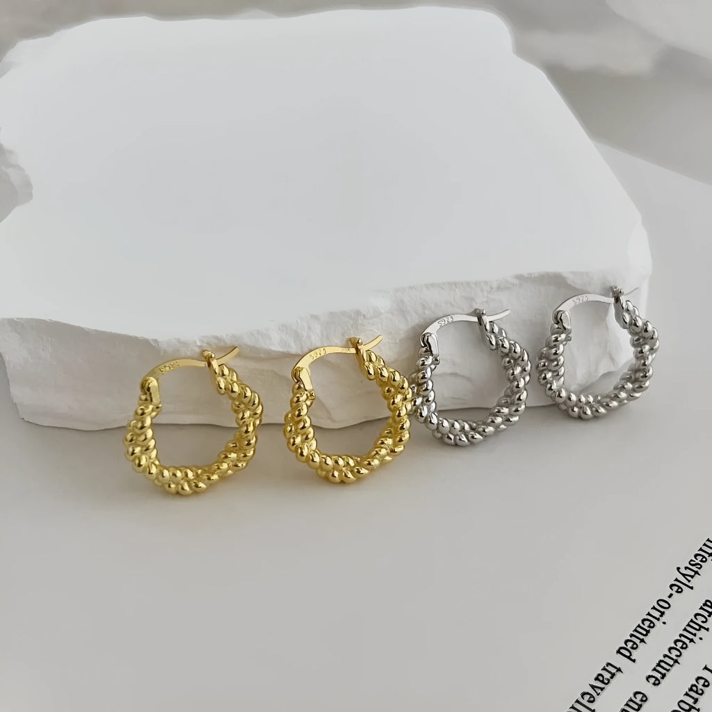 S925 sterling silver geometric stud earrings with electroplated finish, silver tone, front view
