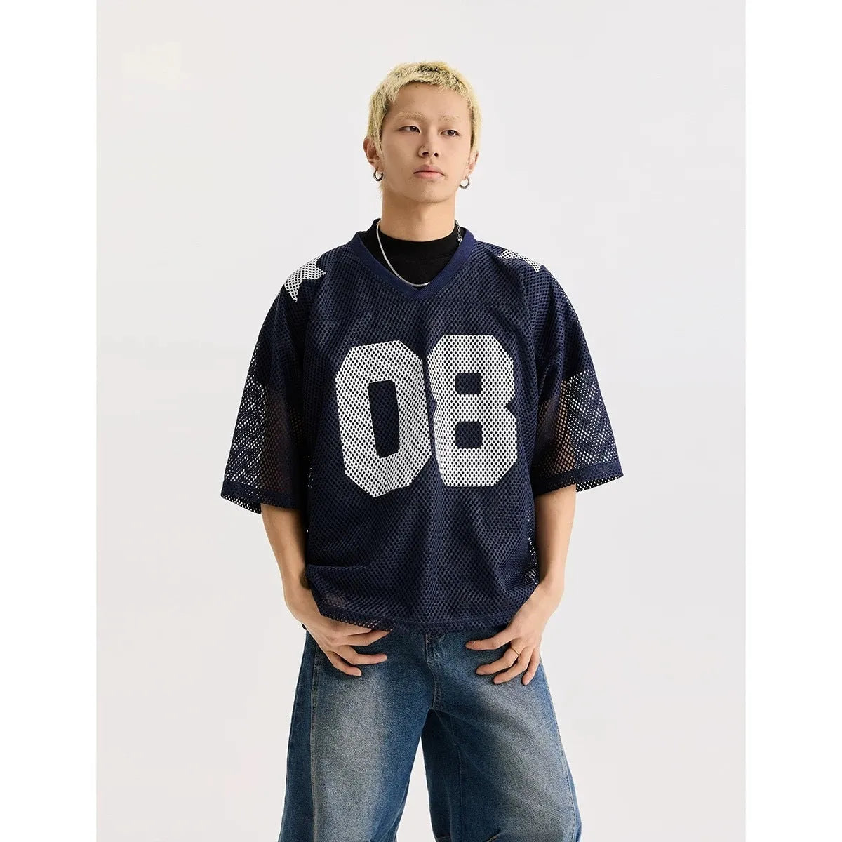 Black half sleeve pullover shirt with white letter pattern design, loose fit casual top