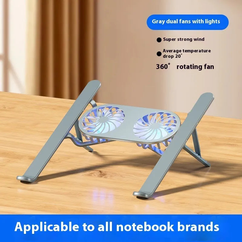 Silver aluminium laptop cooling stand with twin fans and adjustable height mechanism, folded beside notebook computer