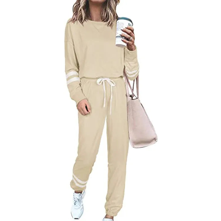 Women's plus size casual two-piece suit set in a solid colour, showing loose-fitting long sleeve top and trousers.