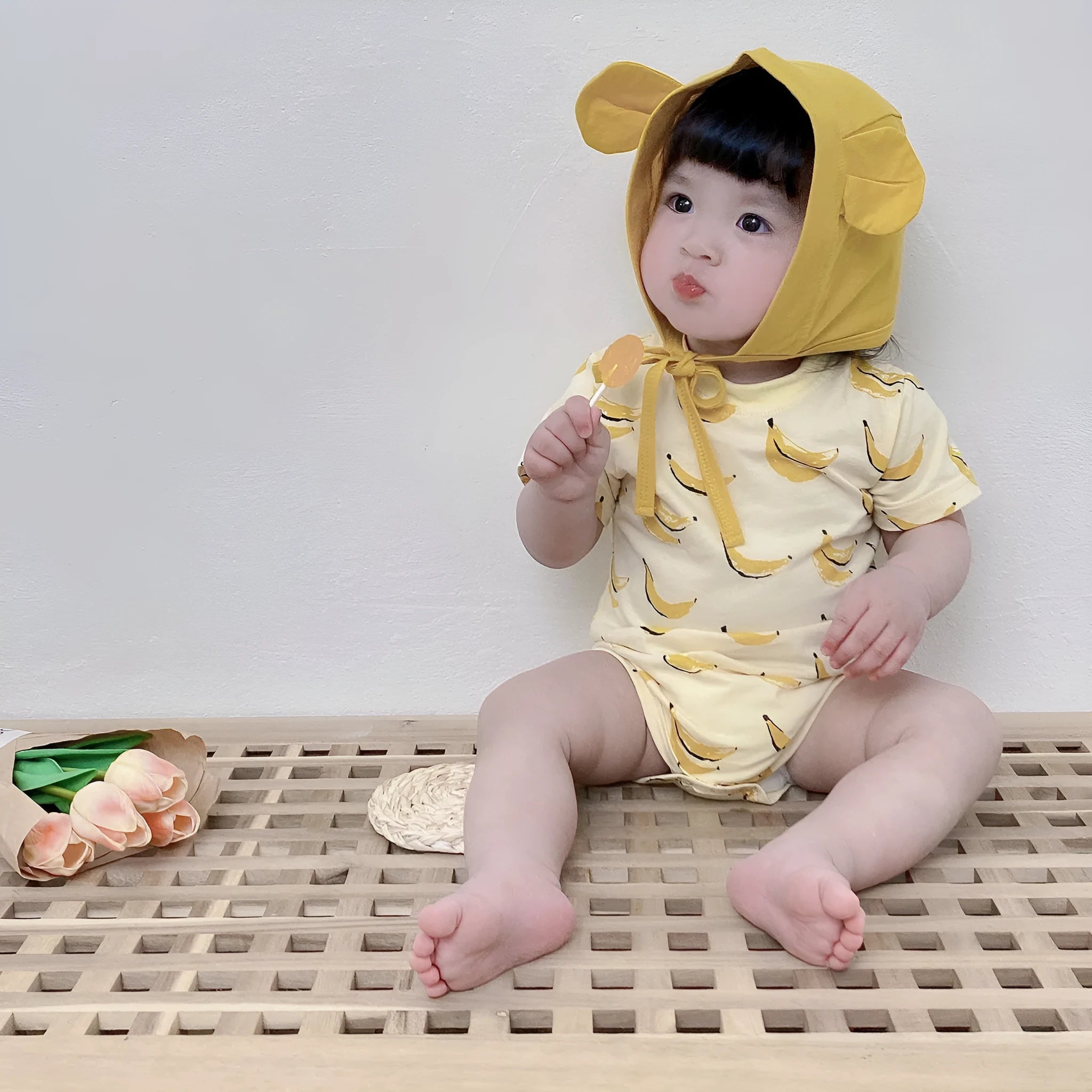 Pure cotton summer romper suit with matching hat in banana colour for baby