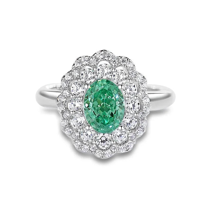 S925 sterling silver ring for women with a green emerald stone set using Palaibahao inlay and diamond accents.