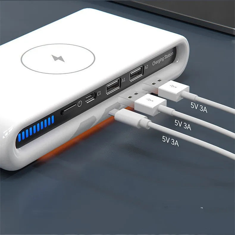 White desktop wireless charging pad with 15W fast charging and a multi-colour LED atmosphere lamp on top.