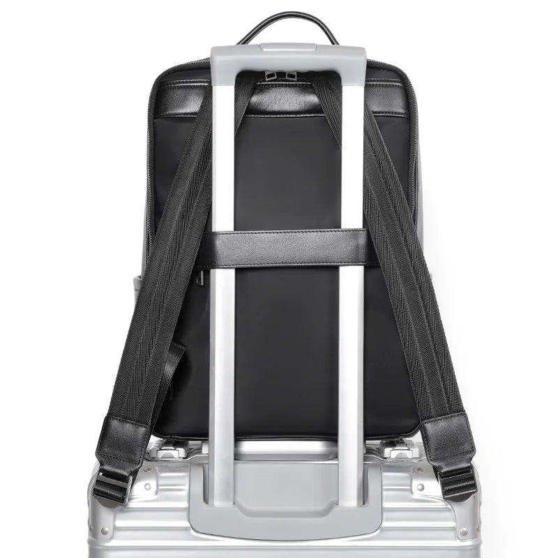 Black genuine leather men's computer backpack with a large main compartment.