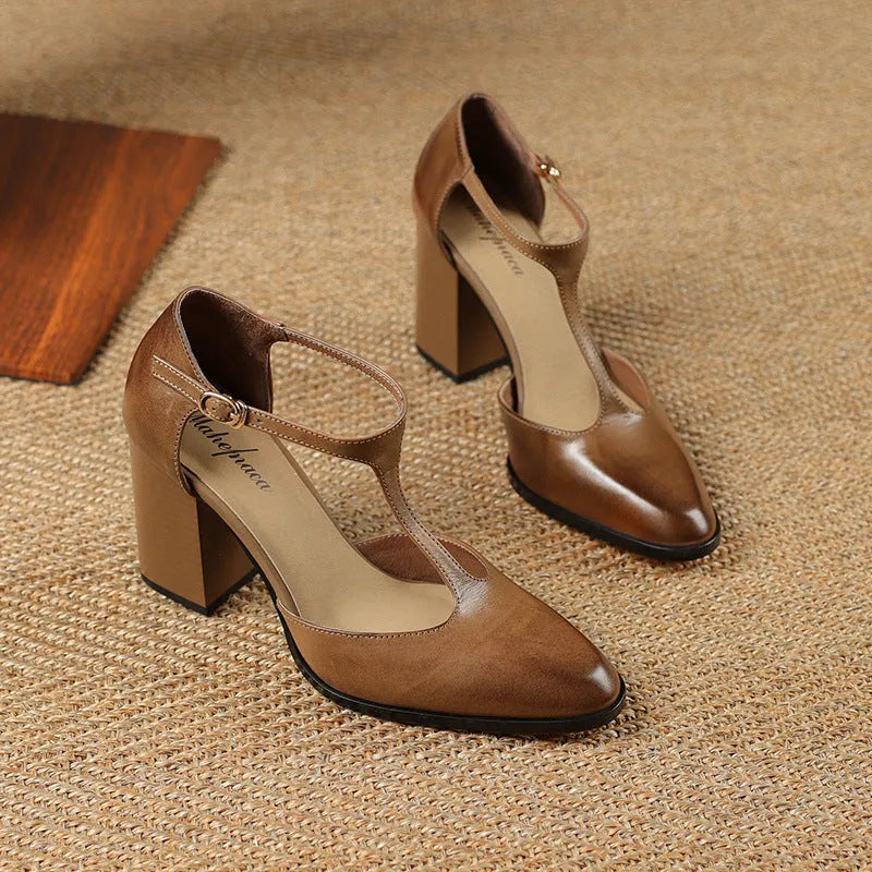 Women's pink retro Mary Jane shoes with a pointed toe, buckle strap, and cowhide leather upper.
