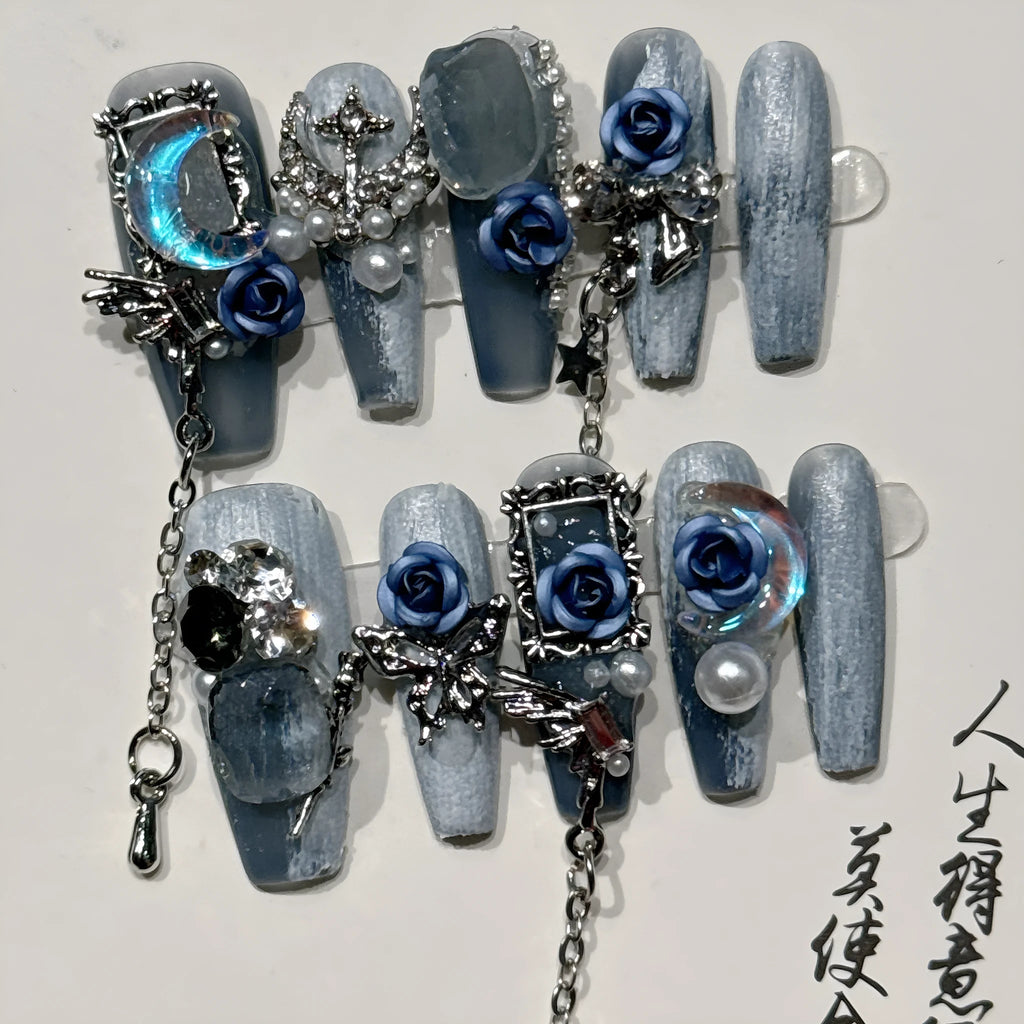 Blue artificial nails with rose flower pattern for evening manicure in four sizes