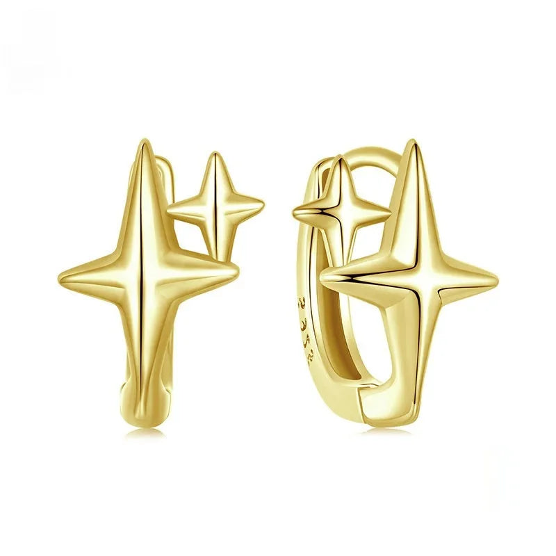 Minimalist star design sterling silver clip-on earring with XINGX motif.